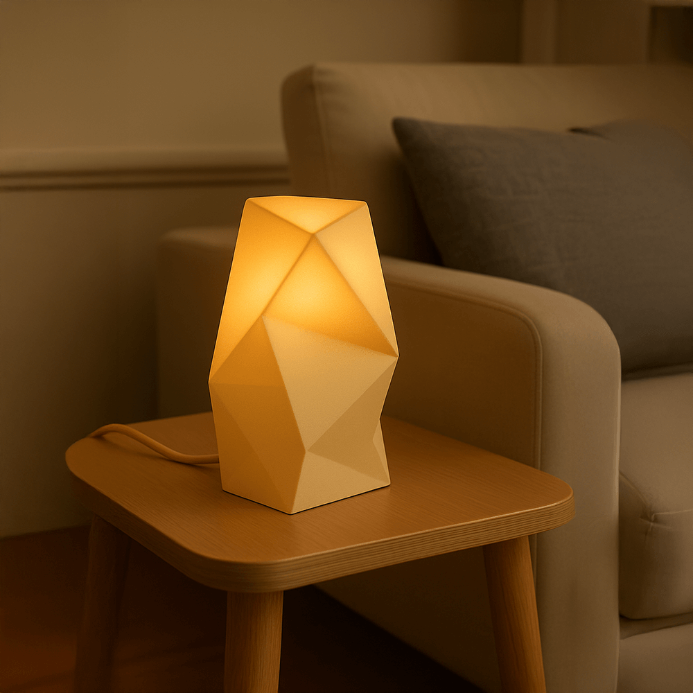 Astra Tischlampe – Skulpturale Designerlampe in Gold