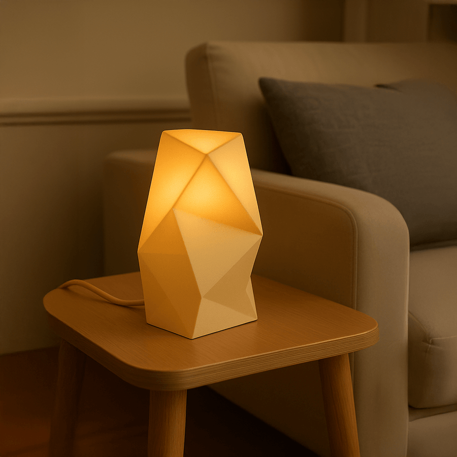 Astra Tischlampe – Skulpturale Designerleuchte in Gold